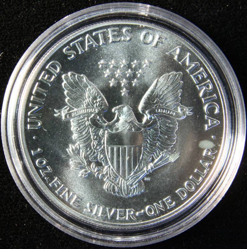 1987 AMERICAN SILVER EAGLE 1 TROY OZ. .999 FINE SILVER DOLLAR IN AIRTITE CAPSULE