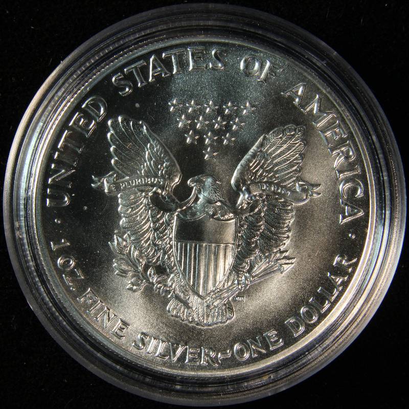 1987 AMERICAN SILVER EAGLE 1 TROY OZ. .999 FINE SILVER DOLLAR IN AIRTITE CAPSULE