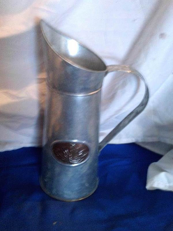 tin pitcher