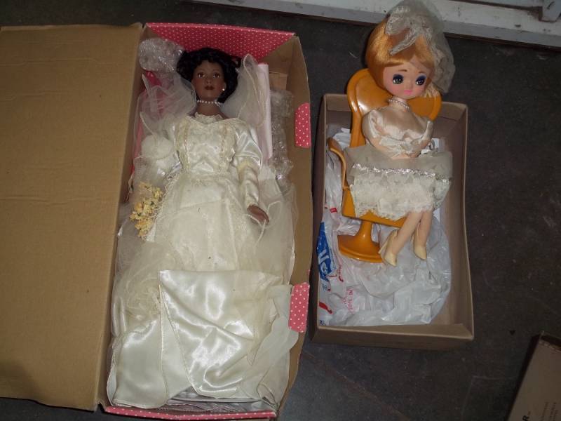 lot 94 image: Pair of Porcelain Dolls one with chair