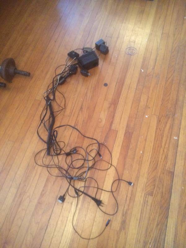 Box of cords and old phone