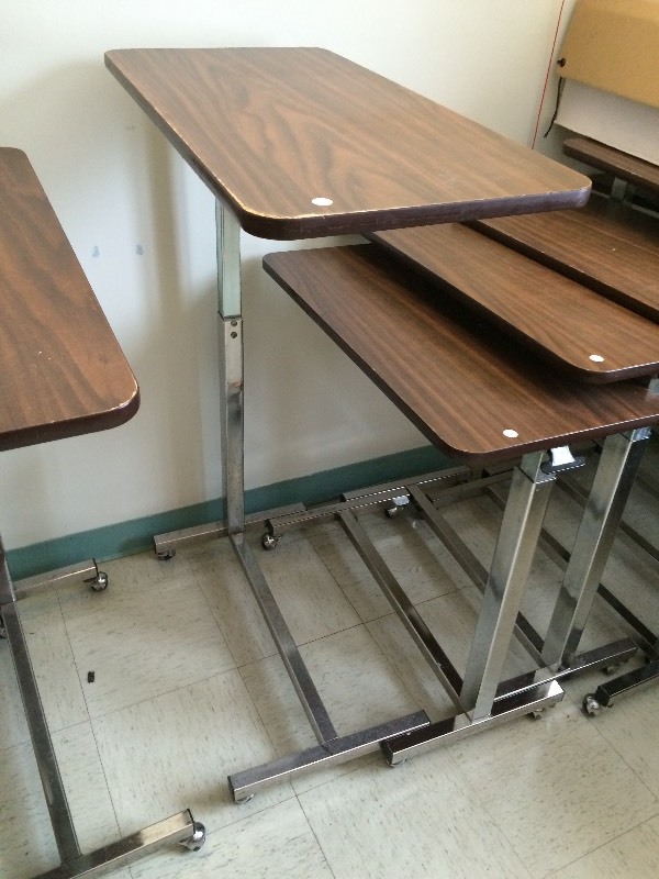 Rolling adjustable table