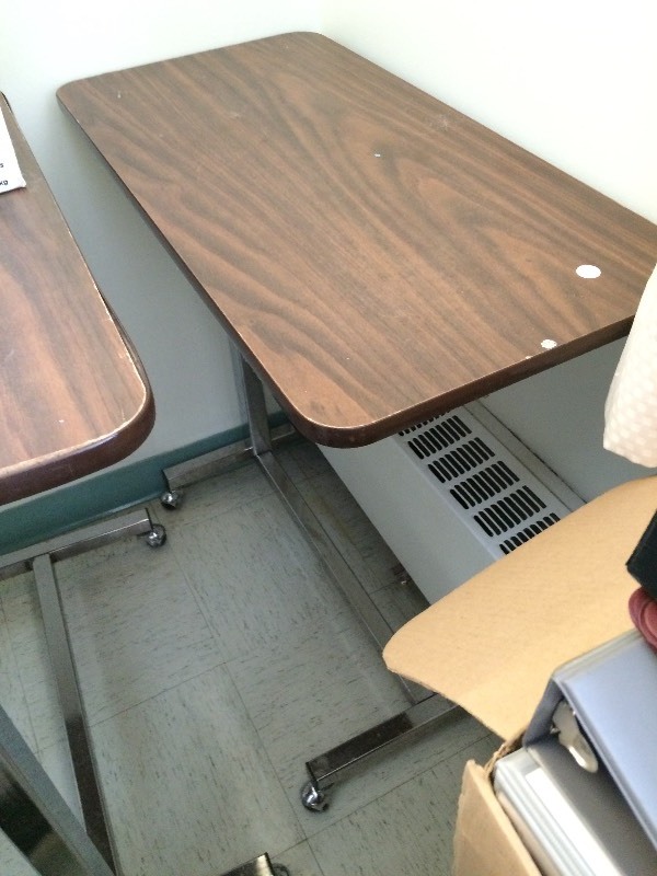 Rolling adjustable table