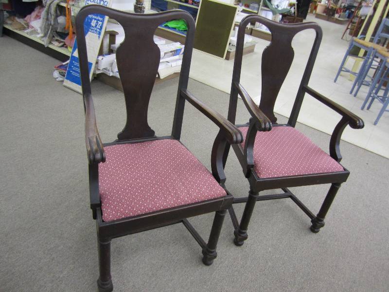 2 solid wood upholstered chairs...