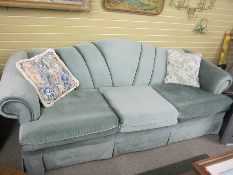 Sage color couch, nice upholstry...