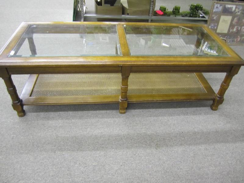 Glass top coffee table, 21 X 50 an...