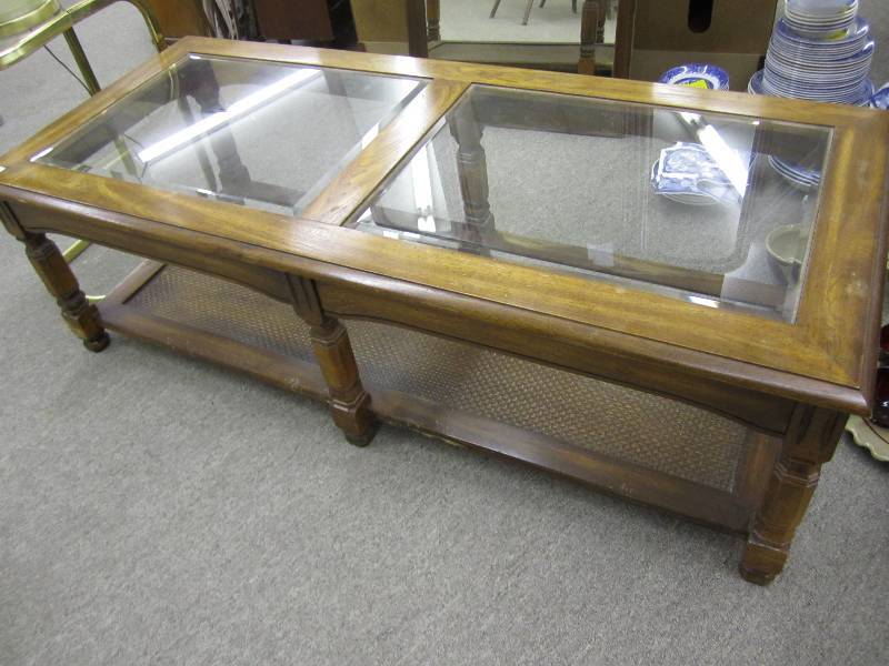 Glass top coffee table, 21 X 50 an...