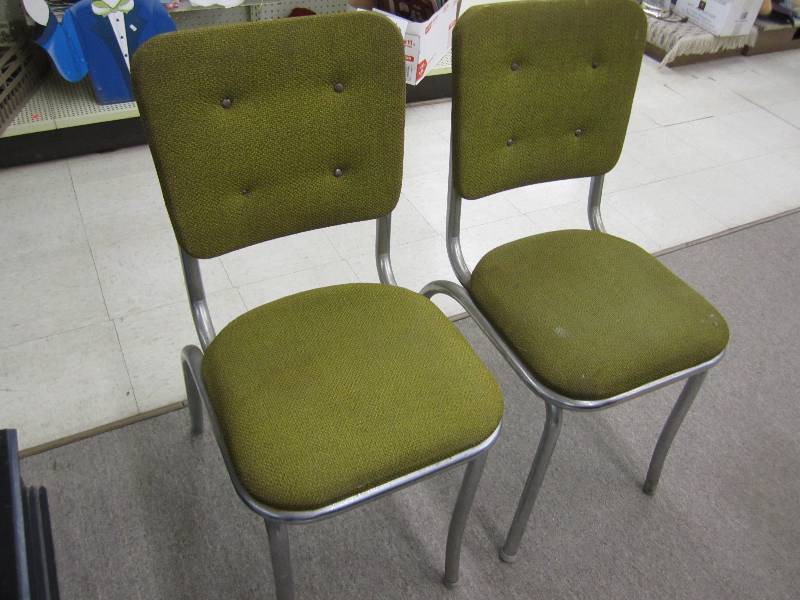 2 Metal framed green chairs...