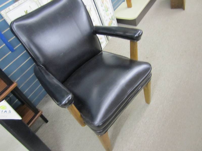 Wood frame vinyl upholstered chair...
