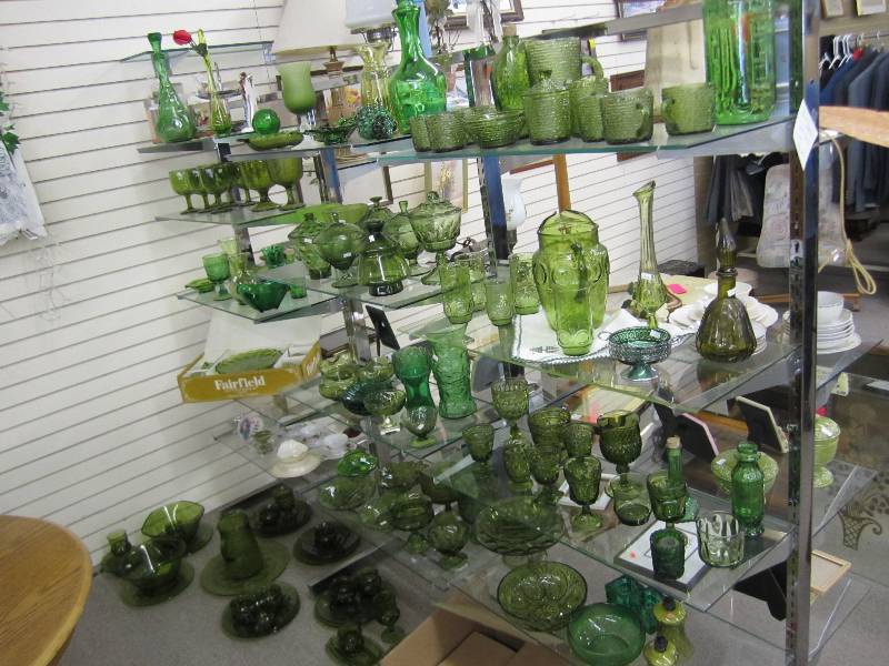 VERY LARGE display of green glasswa...