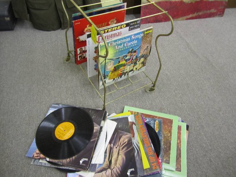 Metal record stand with albums...