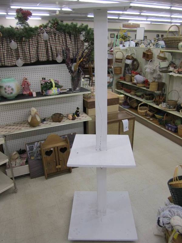 73 tall wood tiered shelf on wheel...