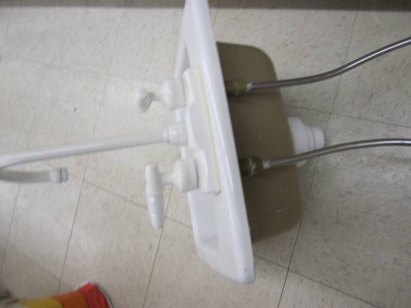 White sink and faucet, 15 x 15...
