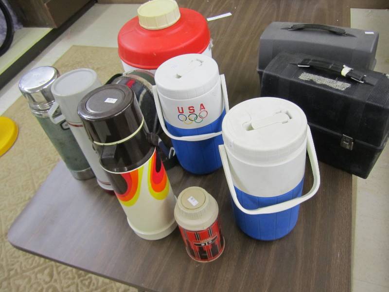 lot of lunchboxes and coolers...