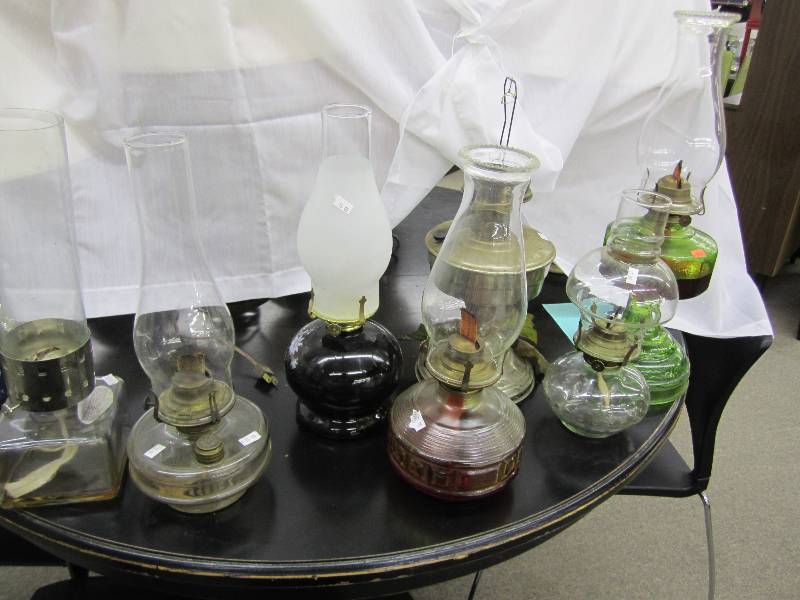 Lot of oil lamps, many nice old pie...
