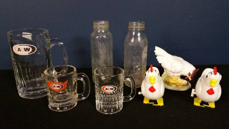 lot 31 image: Vintage A&W Mugs, Vintage Evenflo Glass Bottles, Chickens