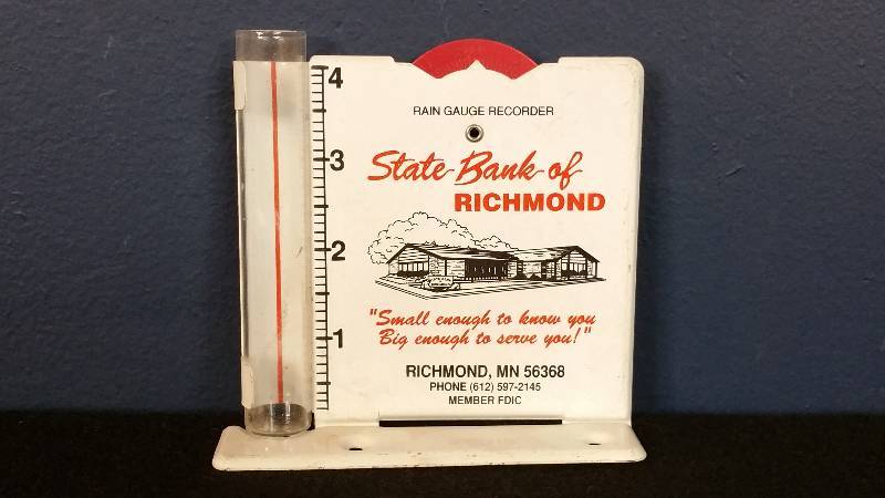 lot 52 image: Vintage Minn. Bank rain Guage Promotional Item
