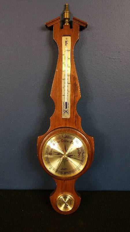 lot 54 image: Vintage Cuckoo Clock Co. Blue Mercury Banjo Themometer