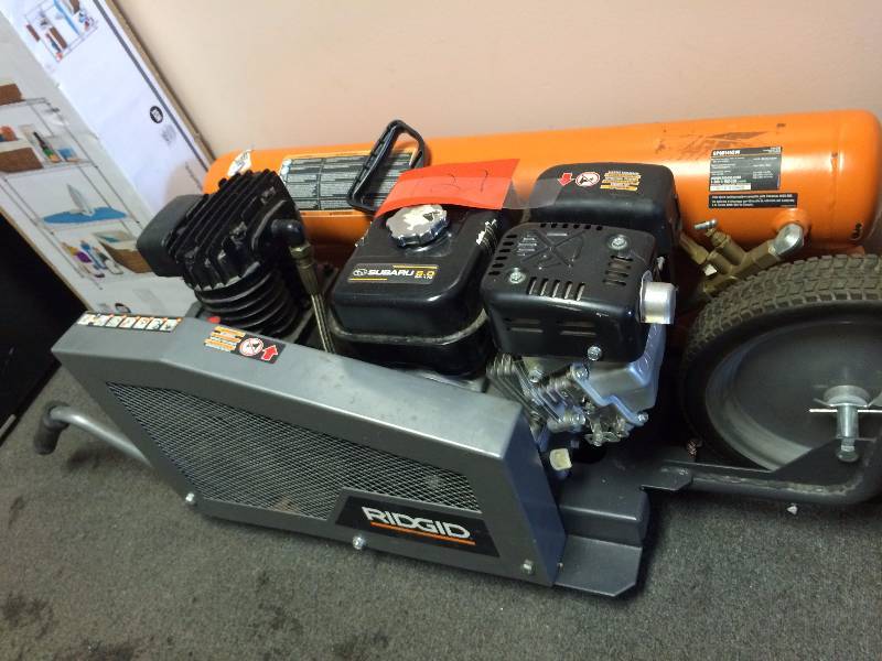Ridgid 8 gal. Portable Gas-Powered Orange Air Compressor features a Subaru commercial-grade engine Tested works