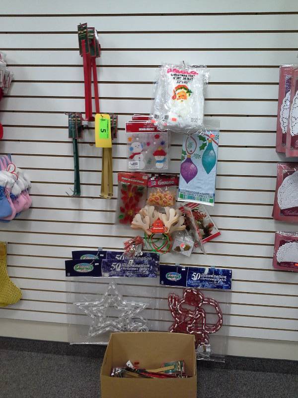 Various assortment of Christmas decorations and wreath hangers
