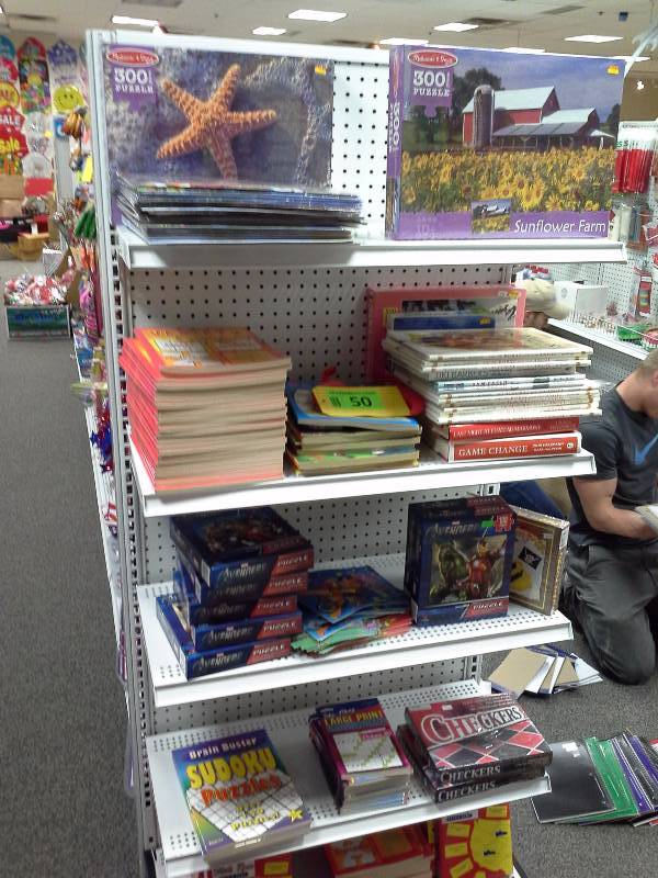 Assortment of books, games, and puzzles