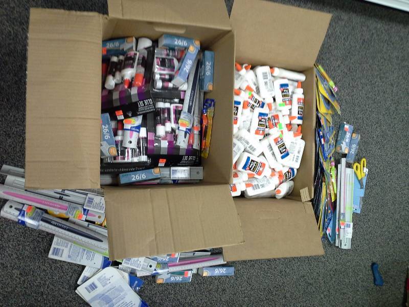 Assortment of school supplies, large quantity of glue
