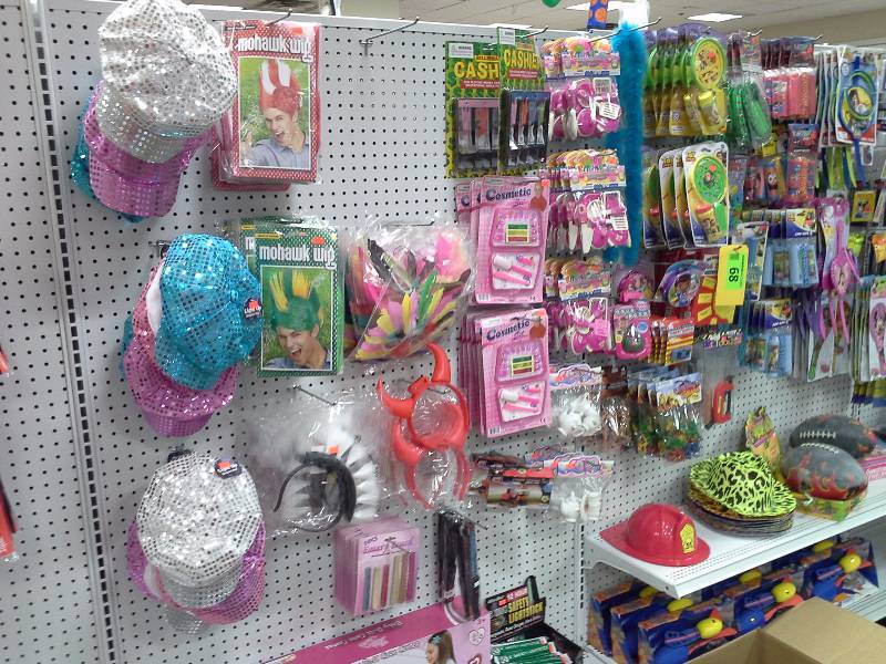 Assortment of hats, wigs, toys