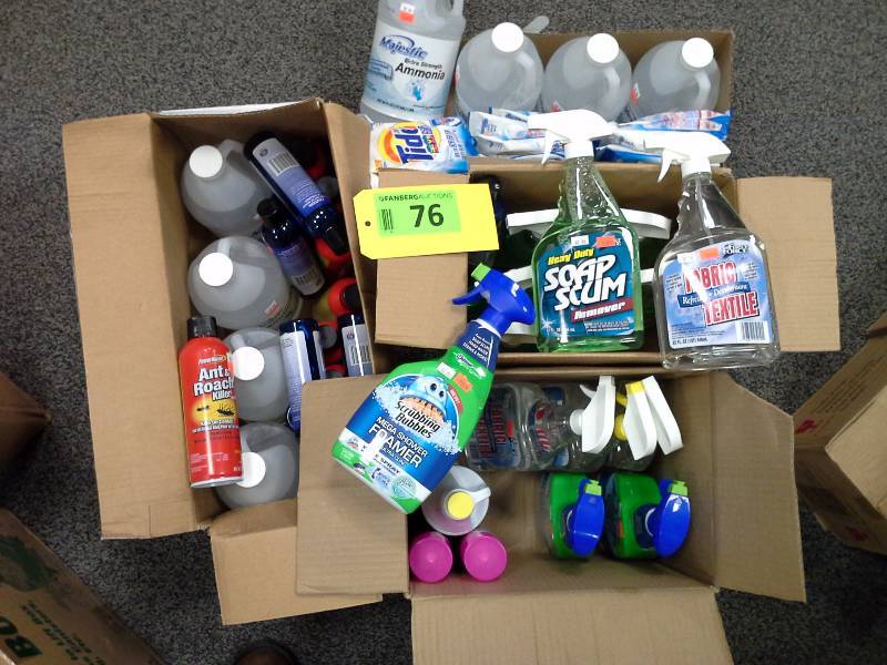 Four boxes of various cleaners, shower sprays, ammonia