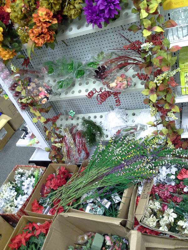 Large assortment of silk flowers, other grasses