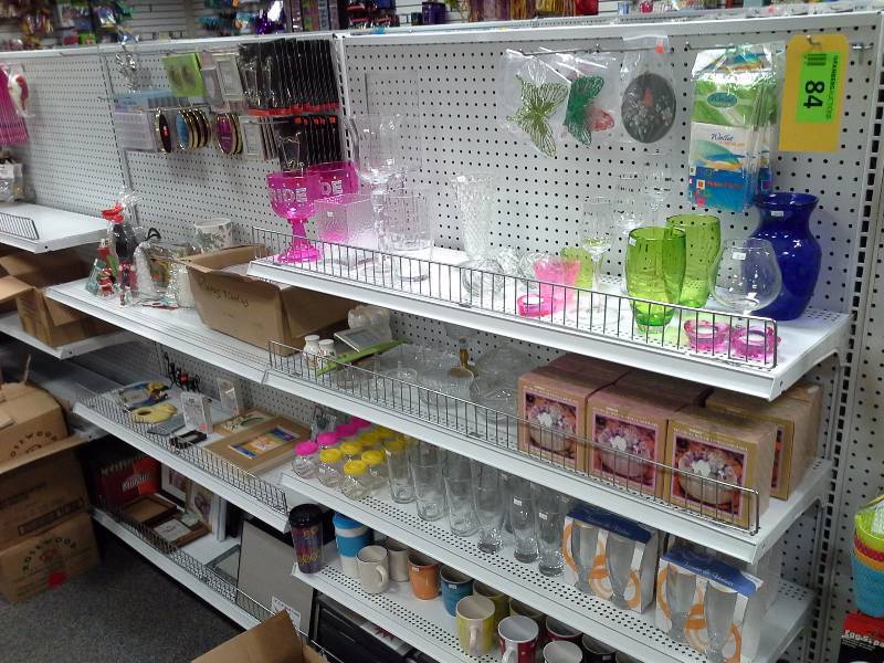 Assortment of frames, plates, glasses, other decorative items