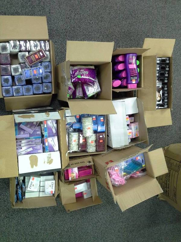 11 boxes of health and beauty supplies, pregnancy tests, shower curtain rings