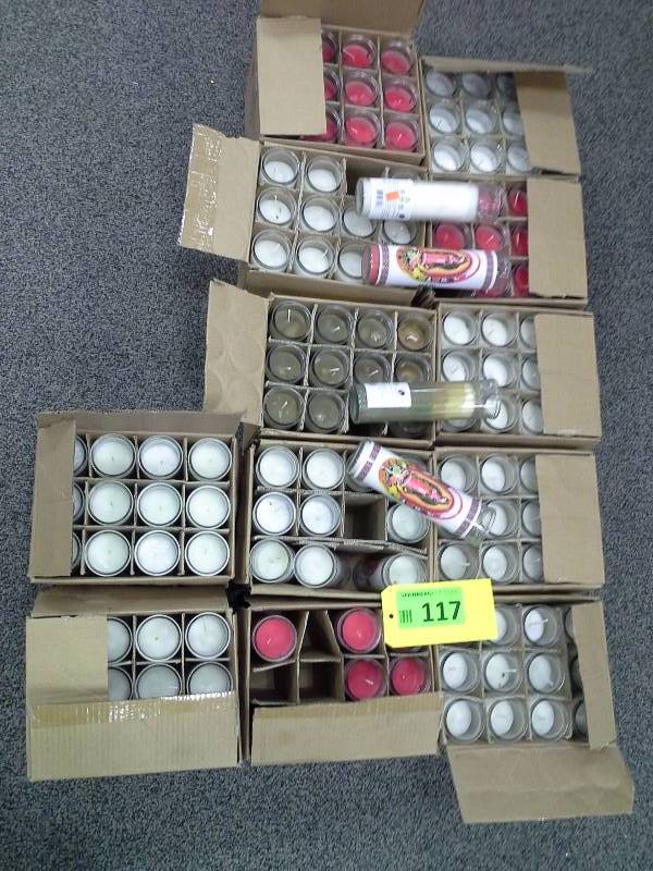 12 boxes of religious candles, approximately 140