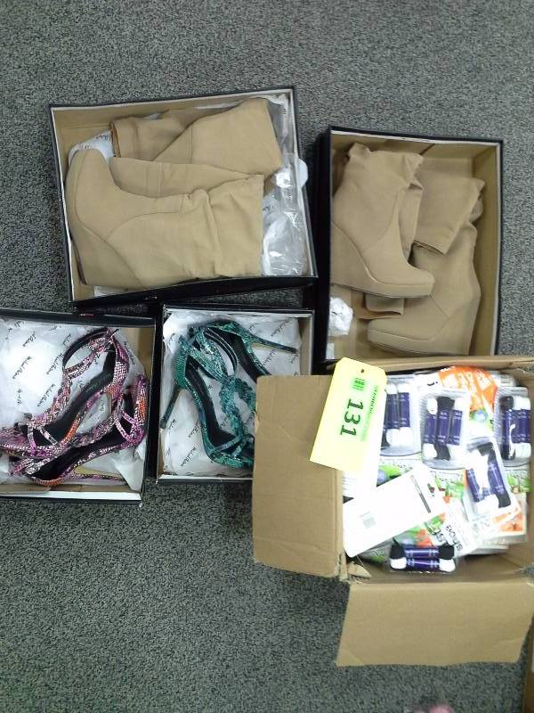 Four boxes of various womens shoes, shoe accessories