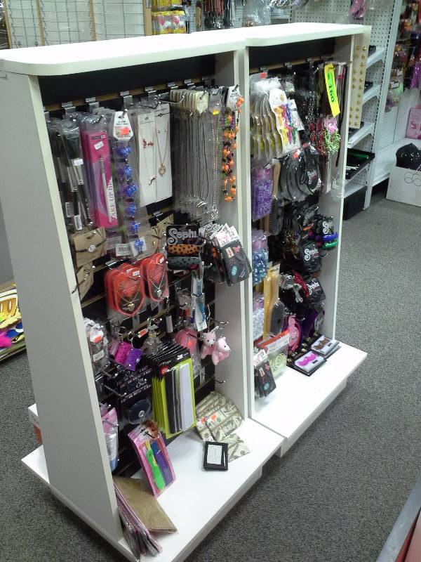 Assortment of womens fashion accessories, and two-sided display