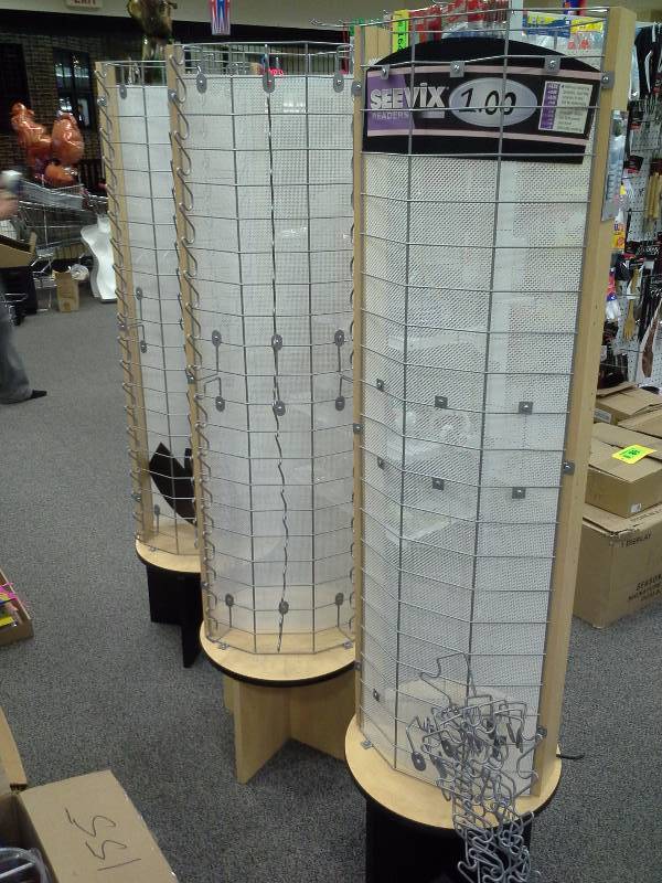 Three sunglass display racks