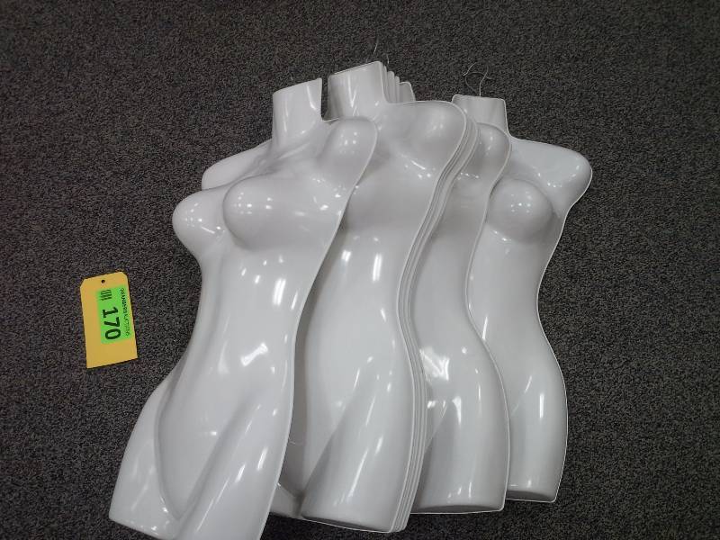 About 10 hanging mannequins, torsos only