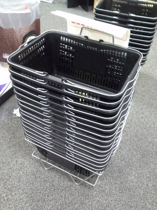 Stack of shopping baskets with stand