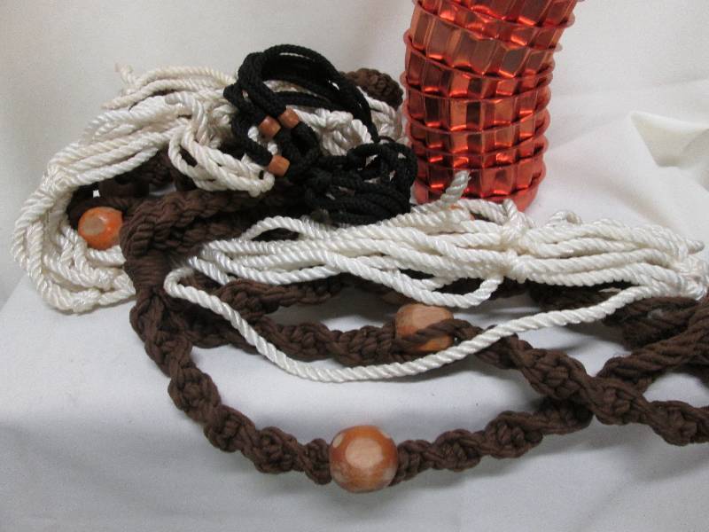 Multiple macrame plant holders, 11 ...