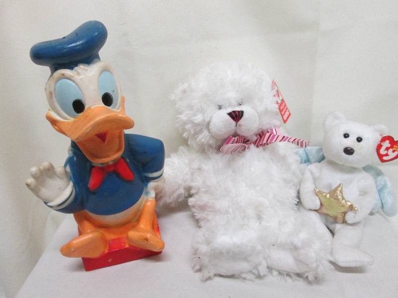 Donald Duck bank, GanZ plush bear, ...
