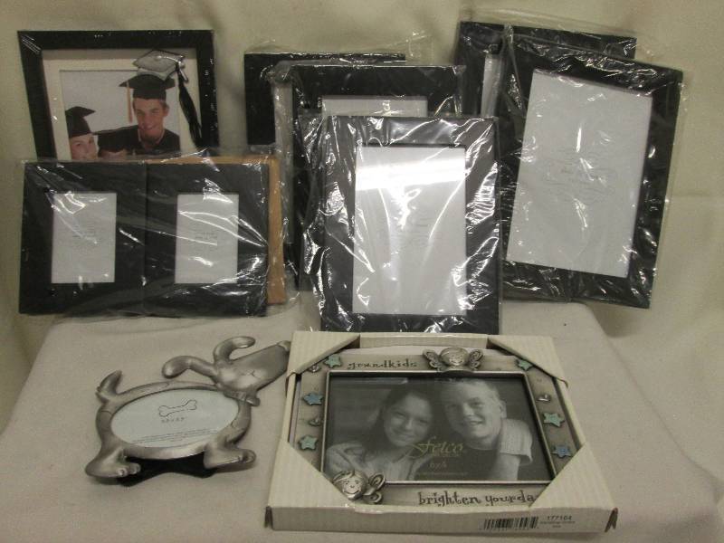 Assorted sized photo frames, 1 Gran...