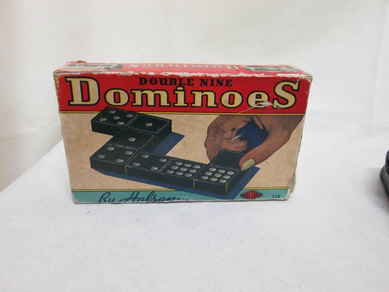 Vintage dominoes, 35mm camera...