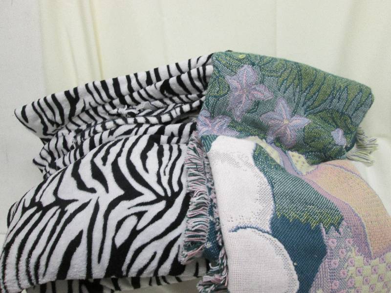 Lot of 2 blankets 1 plush, 1 woven...