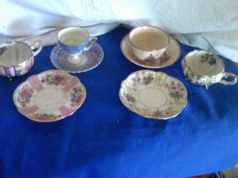 4 teacups and saucers