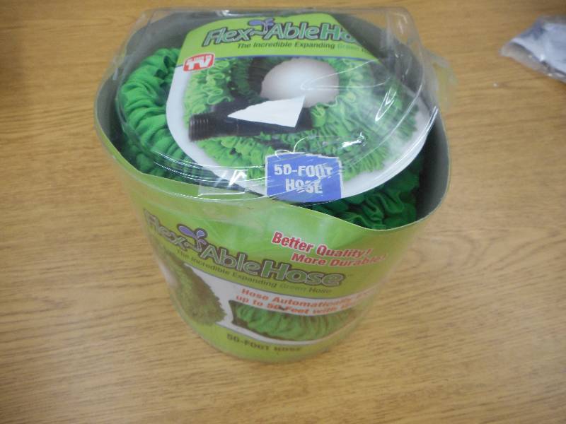 lot 5 image: 50 FOOT FLEX ABLE HOSE