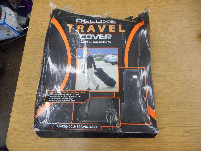 lot 9 image: DELUXE TRAVEL COVER WITH WHEELS FOR GOLF CLUBS
