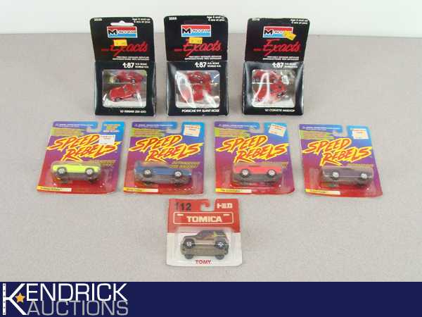 8 Vintage MINT ON CARDIN BOX Johnny Lightning Speed Rebels, and Misc Scale Cars
