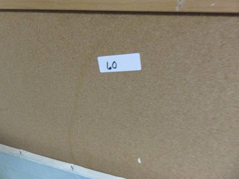 two pictures and large corkboard