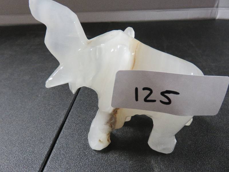 small stone elephant figurine