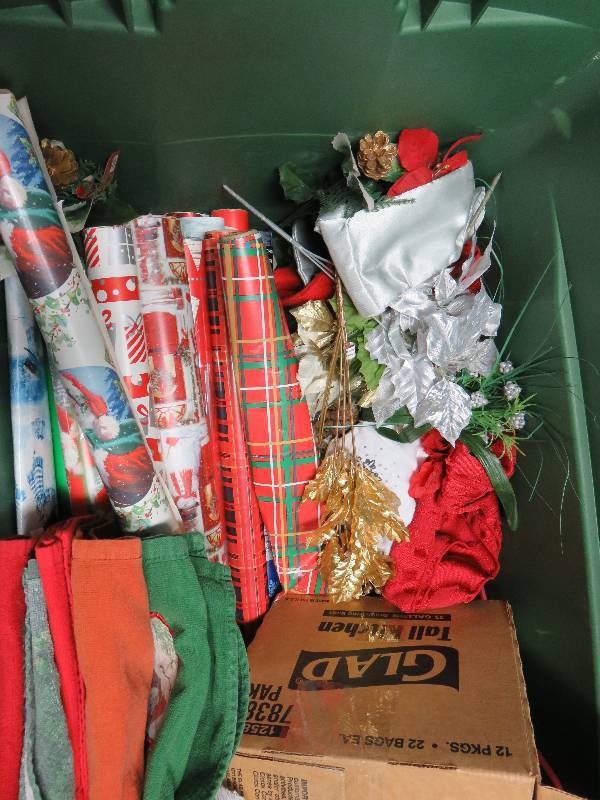two large bins of Christmas decoration