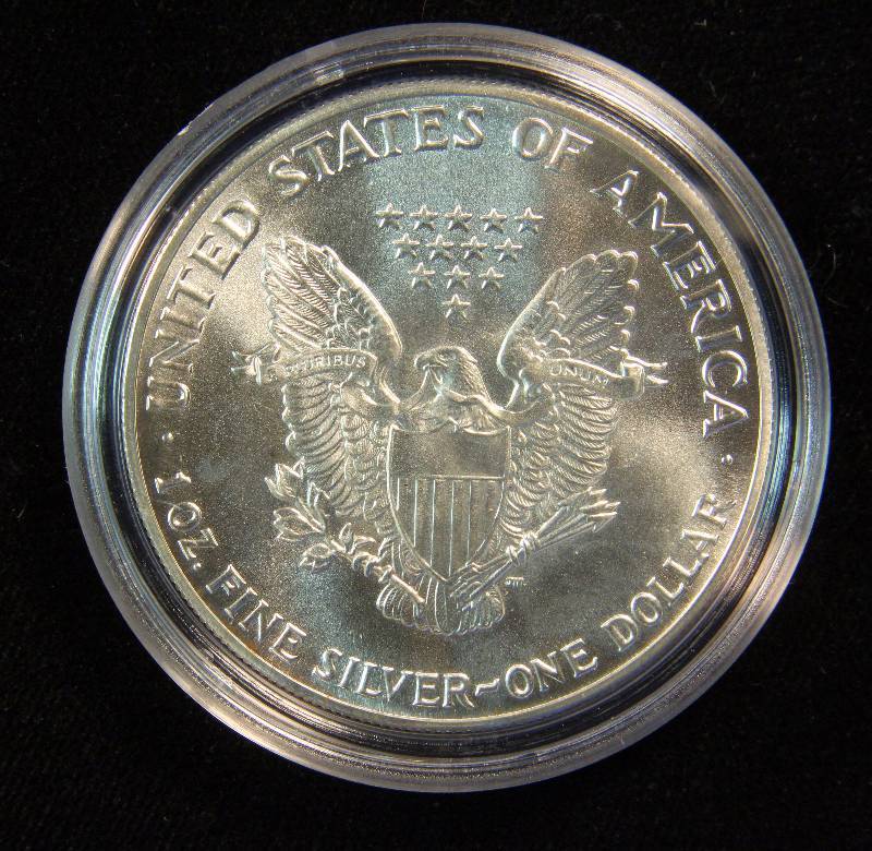1986 AMERICAN SILVER EAGLE 1 TROY OZ. .999 FINE SILVER DOLLAR IN AIRTITE CAPSULE